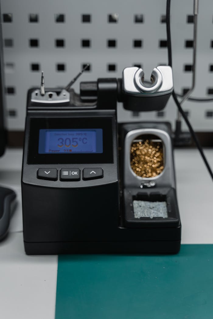 my-steps A digital soldering station with temperature display ready for precision electronic repair.